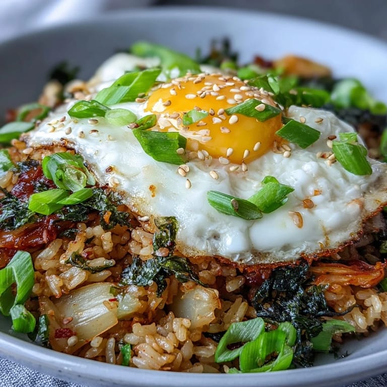 Enjoy this savory Korean-inspired kimchi fried rice bowl, ready in minutes.