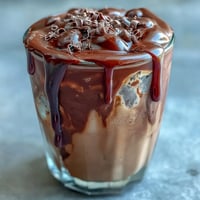 Velvety chocolate cream swirls atop chilled cold brew in this decadent Chocolate Cream Cold Brew, a rich coffeehouse treat.